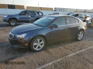 ✅ 2014 Chevrolet Cruze 2LT • VIN: 1G1PE5SB9E7372858 • Lot: 70958125. Listed on Copart with 114,063 mi. Free auction sales archive from the USA and detailed vehicle history report at DreamBid. Image 1.