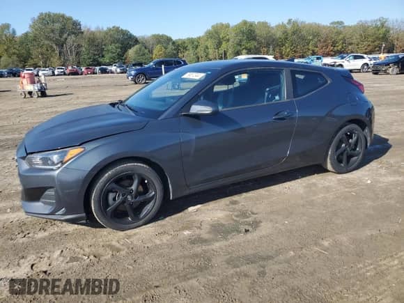 2019 Hyundai Veloster 2.0 z VIN KMHTG6AF1KU016892, wystawiony jako Copart lot #79087344 z przebiegiem 102 963 mil mil oraz Czysty tytuł • Clean title. Historia ofert i sprzedaży dostępna na DreamBid. Obrazek 1.