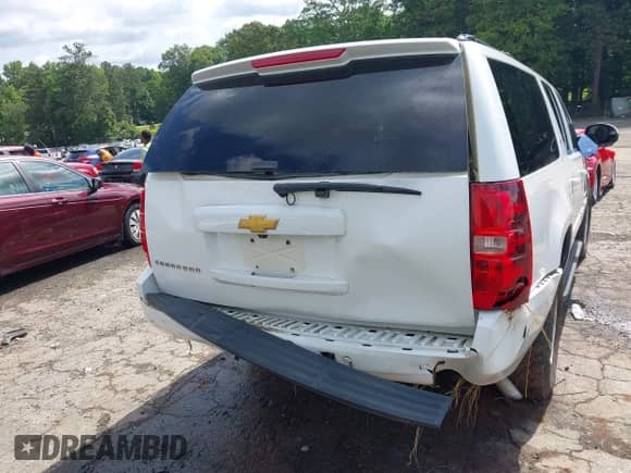 2014 Chevrolet Suburban LT z VIN 1GNSCJE07ER211222, wystawiony jako IAAI lot #42428084 z przebiegiem 214 712 mil mil oraz . Historia ofert i sprzedaży dostępna na DreamBid. Obrazek 16.