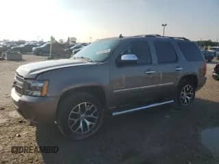 2013 Chevrolet Tahoe LTZ with VIN 1GNSKCE05DR284635, listed as a Copart auction lot 64638575 with 162,319 mi miles and Clean title. Bid and sale history available at DreamBid. Image 1.