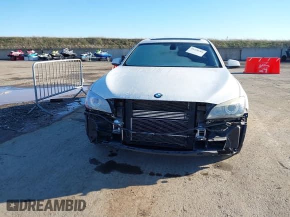 ✅ 2012 BMW 7 Series 750Li • VIN: WBAKB8C58CC964225 • Лот: 41228368. Опубликован ранее на IAAI с пробегом 94 583 миль. Бесплатный доступ к архиву аукционных продаж из США и подробный отчёт об истории автомобиля на DreamBid. Изображение 6.