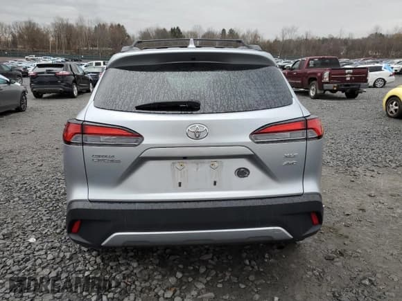 ✅ 2022 Toyota Corolla Cross XLE • VIN: 7MUDAABG7NV031772 • Лот: 92441635. Опубликован ранее на Copart с пробегом 28 503 миль. Бесплатный доступ к архиву аукционных продаж из США и подробный отчёт об истории автомобиля на DreamBid. Изображение 6.