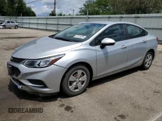 ✅ 2018 Chevrolet Cruze LS • VIN: 1G1BB5SM9J7211070 • Lot: 61216255. Listed on Copart with 99,945 mi. Free auction sales archive from the USA and detailed vehicle history report at DreamBid. Image 1.