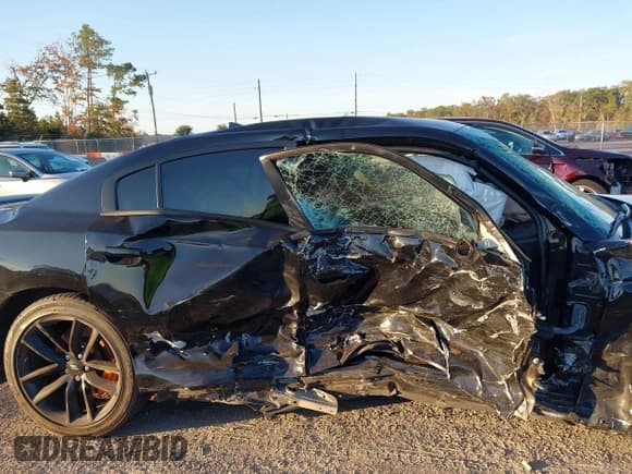 ✅ 2023 Dodge Charger GT • VIN: 2C3CDXHG7PH638980 • Lot: 43711407. Listed on IAAI with 16,736 mi. Free auction sales archive from the USA and detailed vehicle history report at DreamBid. Image 17.