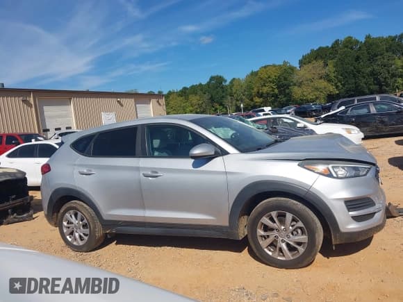 ✅ 2019 Hyundai Tucson SE • VIN: KM8J23A40KU905234 • Лот: 43356661. Опубликован ранее на IAAI с пробегом 142 904 миль. Бесплатный доступ к архиву аукционных продаж из США и подробный отчёт об истории автомобиля на DreamBid. Изображение 13.
