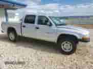 2002 Dodge Dakota Sport z VIN 1B7HG38N02S691280, wystawiony jako Copart lot #66309924 z przebiegiem 227 327 mil mil oraz Czysty tytuł • Clean title. Historia ofert i sprzedaży dostępna na DreamBid. Obrazek 4.