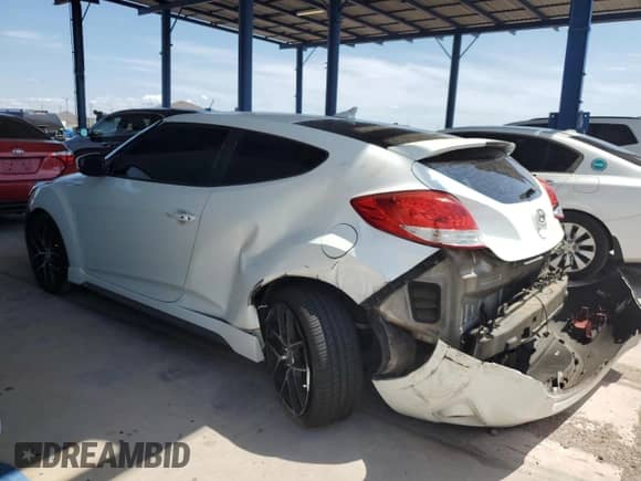 2015 Hyundai Veloster Turbo z VIN KMHTC6AE5FU234312, wystawiony jako Copart lot #66859544 z przebiegiem 133 119 mil mil oraz Szkoda całkowita • Salvage title. Historia ofert i sprzedaży dostępna na DreamBid. Obrazek 2.