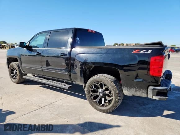 ✅ 2018 Chevrolet Silverado 1500 LT • VIN: 3GCUKREC5JG164974 • Лот: 90520345. Опубликован ранее на Copart с пробегом 171 279 миль. Бесплатный доступ к архиву аукционных продаж из США и подробный отчёт об истории автомобиля на DreamBid. Изображение 2.