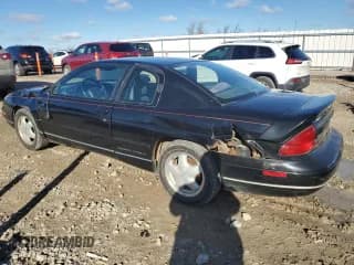 ✅ 1996 Chevrolet Monte Carlo LS • VIN: 2G1WW12MXT9160579 • Лот: 78601644. Опубликован ранее на Copart с пробегом 128 550 миль. Бесплатный доступ к архиву аукционных продаж из США и подробный отчёт об истории автомобиля на DreamBid. Изображение 2.