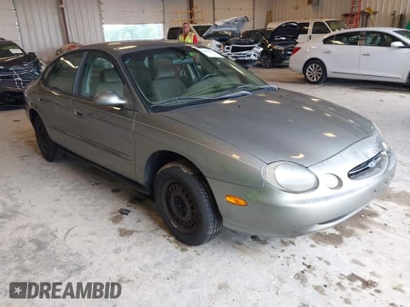 ✅ 1999 Ford Taurus SE • VIN: 1FAFP53U2XA326569 • Lot: 42982665. Listed on IAAI with 194,108 mi. Free auction sales archive from the USA and detailed vehicle history report at DreamBid. Image 1.