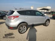 ✅ 2014 Ford Escape Titanium • VIN: 1FMCU0J91EUB49463 • Lot: 93523395. Listed on Copart with 122,340 mi. Free auction sales archive from the USA and detailed vehicle history report at DreamBid. Image 3.