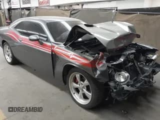 ✅ 2012 Dodge Challenger R/T • VIN: 2C3CDYBT1CH149903 • Lot: 42031543. Wystawiony na IAAI z przebiegiem 198 017 mil. Bezpłatny archiwum sprzedaży aukcyjnych z USA i szczegółowy raport historii pojazdu na DreamBid. Zdjęcie 1.
