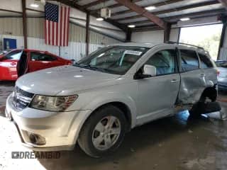 2012 Dodge Journey SXT с VIN 3C4PDDBG2CT132608, выставлен на аукционе Copart как лот 86046045 с пробегом 98 579 миль миль и Списание • Salvage title. История ставок и продаж доступна на DreamBid. Изображение 1.