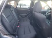 ✅ 2016 Mazda CX-5 Touring • VIN: JM3KE2CY1G0896558 • Лот: 92496255. Опубликован ранее на Copart с пробегом 105 241 миль. Бесплатный доступ к архиву аукционных продаж из США и подробный отчёт об истории автомобиля на DreamBid. Изображение 11.