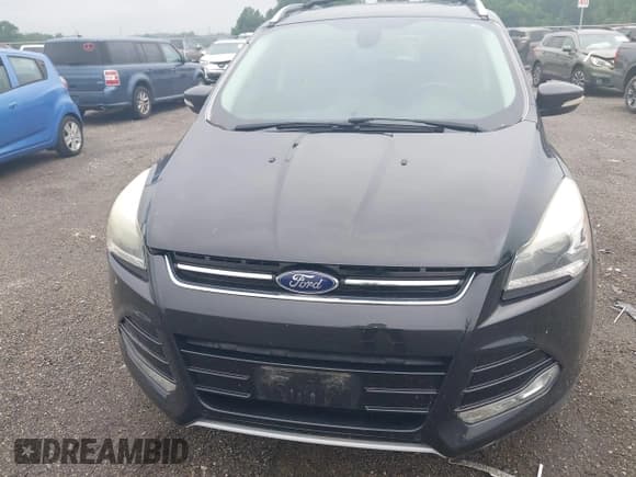 ✅ 2015 Ford Escape Titanium • VIN: 1FMCU0JX7FUB00462 • Lot: 42532943. Listed on IAAI with 88,623 mi. Free auction sales archive from the USA and detailed vehicle history report at DreamBid. Image 6.