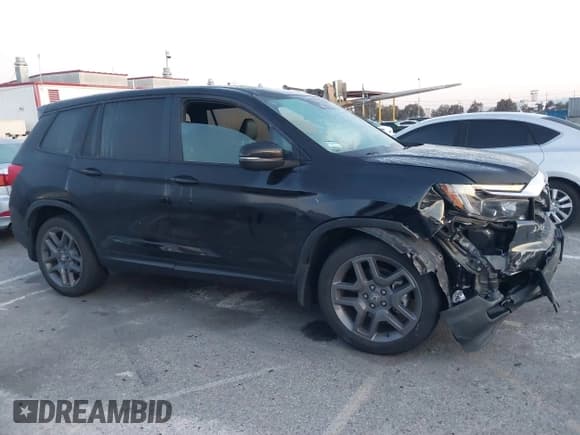 ✅ 2022 Honda Passport EX-L • VIN: 5FNYF7H53NB005762 • Lot: 41824602. Listed on IAAI with 28,104 mi. Free auction sales archive from the USA and detailed vehicle history report at DreamBid. Image 13.