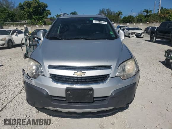 ✅ 2012 Chevrolet Captiva Sport LS • VIN: 3GNAL2EK7CS639997 • Lot: 59946635. Wystawiony na Copart z przebiegiem 124 770 mil. Bezpłatny archiwum sprzedaży aukcyjnych z USA i szczegółowy raport historii pojazdu na DreamBid. Zdjęcie 5.