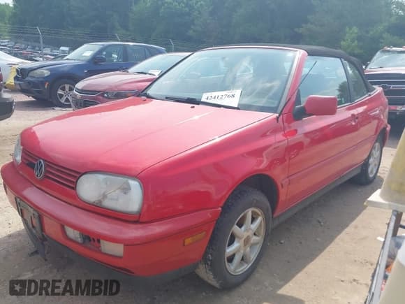 ✅ 1999 Volkswagen Cabriolet • VIN: 3VWBB81E1XM805229 • Lot: 42412768. Listed on IAAI with 121,449 mi. Free auction sales archive from the USA and detailed vehicle history report at DreamBid. Image 2.