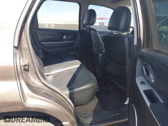 2006 Mercury Mariner Luxury с VIN 4M2YU56186KJ01007, выставлен на аукционе IAAI как лот 42374980 с пробегом 157 209 миль миль и . История ставок и продаж доступна на DreamBid. Изображение 8.