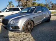 ✅ 2019 Bentley Bentayga V8 • VIN: SJAAM2ZV4KC024727 • Lot: 74625214. Listed on Copart with Not provided. Free auction sales archive from the USA and detailed vehicle history report at DreamBid. Image 1.