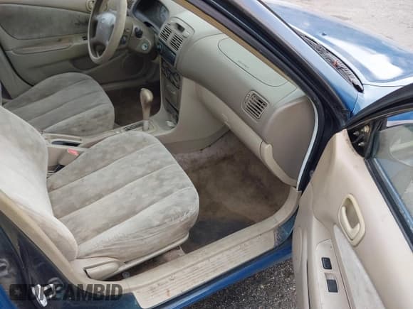 ✅ 1999 Toyota Corolla VE • VIN: 2T1BR12E9XC232710 • Лот: 43741518. Опубликован ранее на IAAI с пробегом 189 148 миль. Бесплатный доступ к архиву аукционных продаж из США и подробный отчёт об истории автомобиля на DreamBid. Изображение 5.