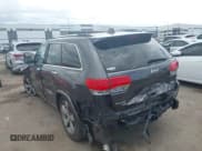 ✅ 2014 Jeep Grand Cherokee Overland • VIN: 1C4RJFCG6EC211600 • Lot: 43289489. Listed on IAAI with 133,935 mi. Free auction sales archive from the USA and detailed vehicle history report at DreamBid. Image 3.