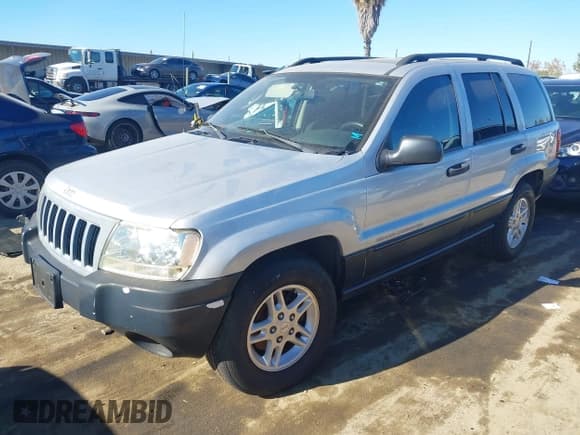 ✅ 2004 Jeep Grand Cherokee Laredo • VIN: 1J4GX48S14C232077 • Lot: 43911088. Listed on IAAI with 117,825 mi. Free auction sales archive from the USA and detailed vehicle history report at DreamBid. Image 2.