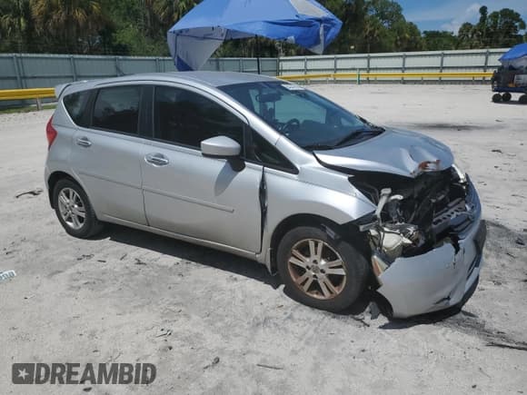 ✅ 2015 Nissan Note SR • VIN: 3N1CE2CP1FL358760 • Lot: 64343595. Listed on Copart with 129,730 mi. Free auction sales archive from the USA and detailed vehicle history report at DreamBid. Image 4.