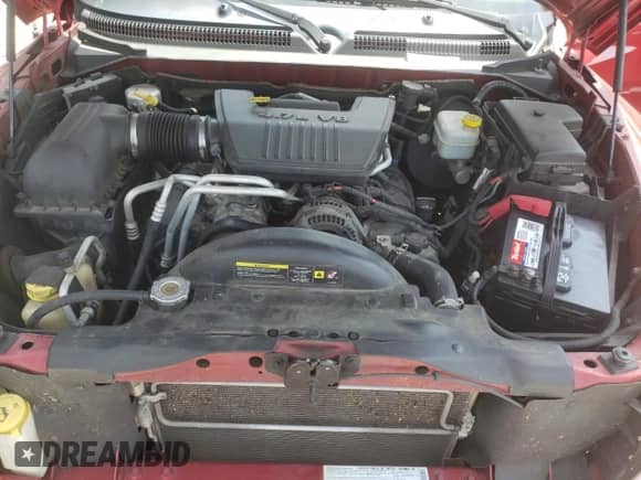 2008 Dodge Dakota Laramie z VIN 1D7HW58N18S517697, wystawiony jako Copart lot #61007934 z przebiegiem Nie podano mil oraz Szkoda całkowita • Salvage title. Historia ofert i sprzedaży dostępna na DreamBid. Obrazek 11.