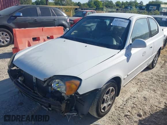 2005 Hyundai Accent GLS с VIN KMHCG35C95U344810, выставлен на аукционе IAAI как лот 41759016 с пробегом 118 202 миль миль и . История ставок и продаж доступна на DreamBid. Изображение 13.