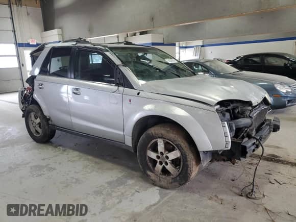2007 Saturn VUE V6 z VIN 5GZCZ534X7S869216, wystawiony jako Copart lot #74670424 z przebiegiem 198 708 mil mil oraz Nie do naprawy • Non repairable. Historia ofert i sprzedaży dostępna na DreamBid. Obrazek 4.