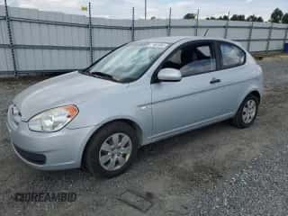 2010 Hyundai Accent GS z VIN KMHCM3AC6AU157310, wystawiony jako Copart lot #71661084 z przebiegiem 185 132 mil mil oraz Szkoda całkowita • Salvage title. Historia ofert i sprzedaży dostępna na DreamBid. Obrazek 1.