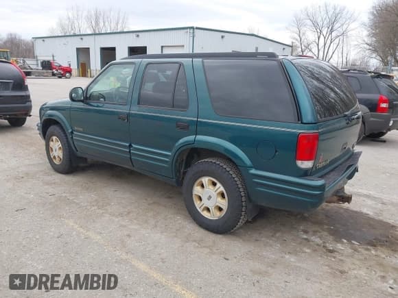 ✅ 1997 Oldsmobile Bravada • VIN: 1GHDT13W2V2706505 • Lot: 41835475. Listed on IAAI with 131,247 mi. Free auction sales archive from the USA and detailed vehicle history report at DreamBid. Image 3.