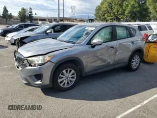 ✅ 2015 Mazda CX-5 Sport • VIN: JM3KE2BEXF0545136 • Lot: 93623125. Listed on Copart with 172,330 mi. Free auction sales archive from the USA and detailed vehicle history report at DreamBid. Image 1.