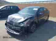 2021 Toyota Prius L Eco with VIN JTDKAMFU4M3144985, listed as a IAAI auction lot 42443957 with 20,816 mi miles and . Bid and sale history available at DreamBid. Image 2.