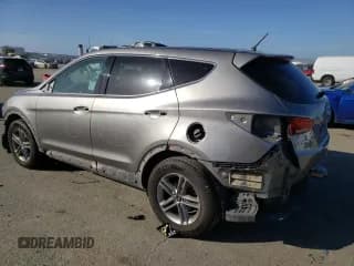 ✅ 2018 Hyundai Santa Fe 2.4L • VIN: 5NMZTDLB0JH089430 • Лот: 40860913. Опубликован ранее на Copart с пробегом 89 896 миль. Бесплатный доступ к архиву аукционных продаж из США и подробный отчёт об истории автомобиля на DreamBid. Изображение 2.
