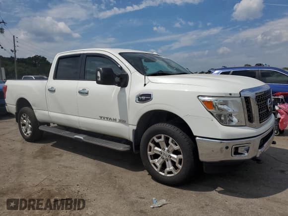 ✅ 2017 Nissan Titan SV • VIN: 1N6AA1F28HN502542 • Лот: 67795974. Опубликован ранее на Copart с пробегом 158 669 миль. Бесплатный доступ к архиву аукционных продаж из США и подробный отчёт об истории автомобиля на DreamBid. Изображение 4.