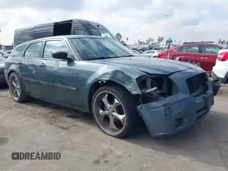 ✅ 2006 Dodge Magnum • VIN: 2D4FV47T76H141321 • Lot: 41502650. Listed on IAAI with 160,867 mi. Free auction sales archive from the USA and detailed vehicle history report at DreamBid. Image 1.