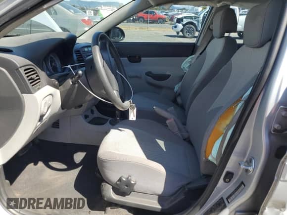 2009 Hyundai Accent Auto GLS z VIN KMHCN46C39U315786, wystawiony jako Copart lot #67562734 z przebiegiem 143 444 mil mil oraz Szkoda całkowita • Salvage title. Historia ofert i sprzedaży dostępna na DreamBid. Obrazek 7.