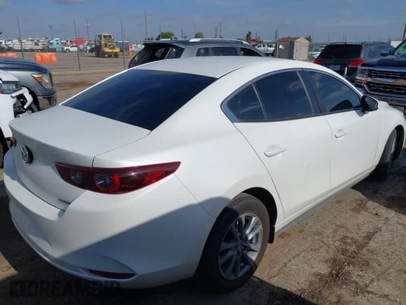 ✅ 2025 Mazda 3 S • VIN: 3MZBPAAM1SM457473 • Lot: 42579847. Listed on IAAI with 13,903 mi. Free auction sales archive from the USA and detailed vehicle history report at DreamBid. Image 4.