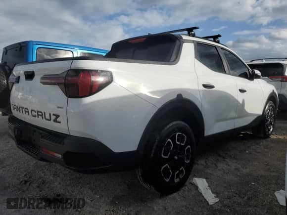 2022 Hyundai Santa Cruz SEL с VIN 5NTJCDAE4NH037836, выставлен на аукционе Copart как лот 78938864 с пробегом 18 226 миль миль и На запчасти • Non repairable. История ставок и продаж доступна на DreamBid. Изображение 3.