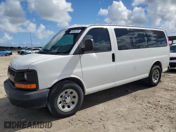 ✅ 2014 Chevrolet Express Passenger LS • VIN: 1GNSGBF44E1147795 • Lot: 90305755. Listed on Copart with 124,358 mi. Free auction sales archive from the USA and detailed vehicle history report at DreamBid. Image 1.