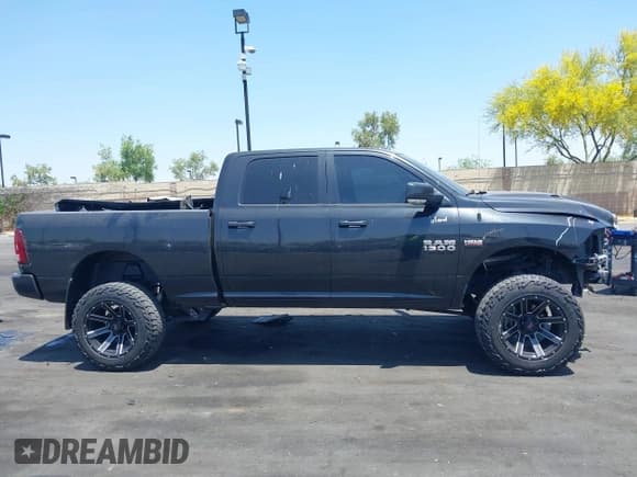 ✅ 2015 Ram 1500 Sport • VIN: 1C6RR7UT1FS684460 • Lot: 42354978. Listed on IAAI with 57,824 mi. Free auction sales archive from the USA and detailed vehicle history report at DreamBid. Image 14.