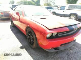 2010 Dodge Challenger SRT-8 z VIN 2B3CJ7DW4AH238109, wystawiony jako IAAI lot #43482689 z przebiegiem 130 832 mil mil oraz . Historia ofert i sprzedaży dostępna na DreamBid. Obrazek 1.