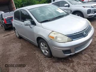 ✅ 2007 Nissan Versa S • VIN: 3N1BC13E67L353100 • Lot: 42356199. Listed on IAAI with 412,765 mi. Free auction sales archive from the USA and detailed vehicle history report at DreamBid. Image 1.