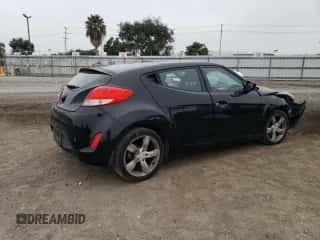 2013 Hyundai Veloster w/Black Int с VIN KMHTC6AD8DU179620, выставлен на аукционе Copart как лот 73060234 с пробегом 149 425 миль миль и Списание • Salvage title. История ставок и продаж доступна на DreamBid. Изображение 3.