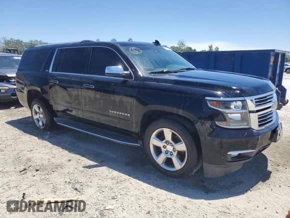 2015 Chevrolet Suburban LTZ z VIN 1GNSCKKC5FR552981, wystawiony jako Copart lot #62795914 z przebiegiem 142 590 mil mil oraz Szkoda całkowita • Salvage title. Historia ofert i sprzedaży dostępna na DreamBid. Obrazek 4.