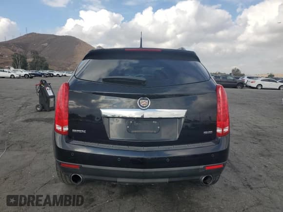 ✅ 2012 Cadillac SRX Performance Collection • VIN: 3GYFNBE31CS577198 • Lot: 81932555. Listed on Copart with 194,810 mi. Free auction sales archive from the USA and detailed vehicle history report at DreamBid. Image 6.