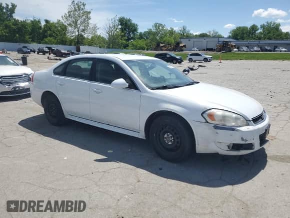 2013 Chevrolet Impala Police with VIN 2G1WD5E32D1221309, listed as a Copart auction lot 58130175 with 123,107 mi miles and Salvage title. Bid and sale history available at DreamBid. Image 4.