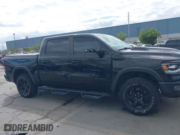 ✅ 2021 Ram 1500 Rebel • VIN: 1C6SRFLTXMN574032 • Lot: 43409254. Wystawiony na IAAI z przebiegiem 34 480 mil. Bezpłatny archiwum sprzedaży aukcyjnych z USA i szczegółowy raport historii pojazdu na DreamBid. Zdjęcie 14.